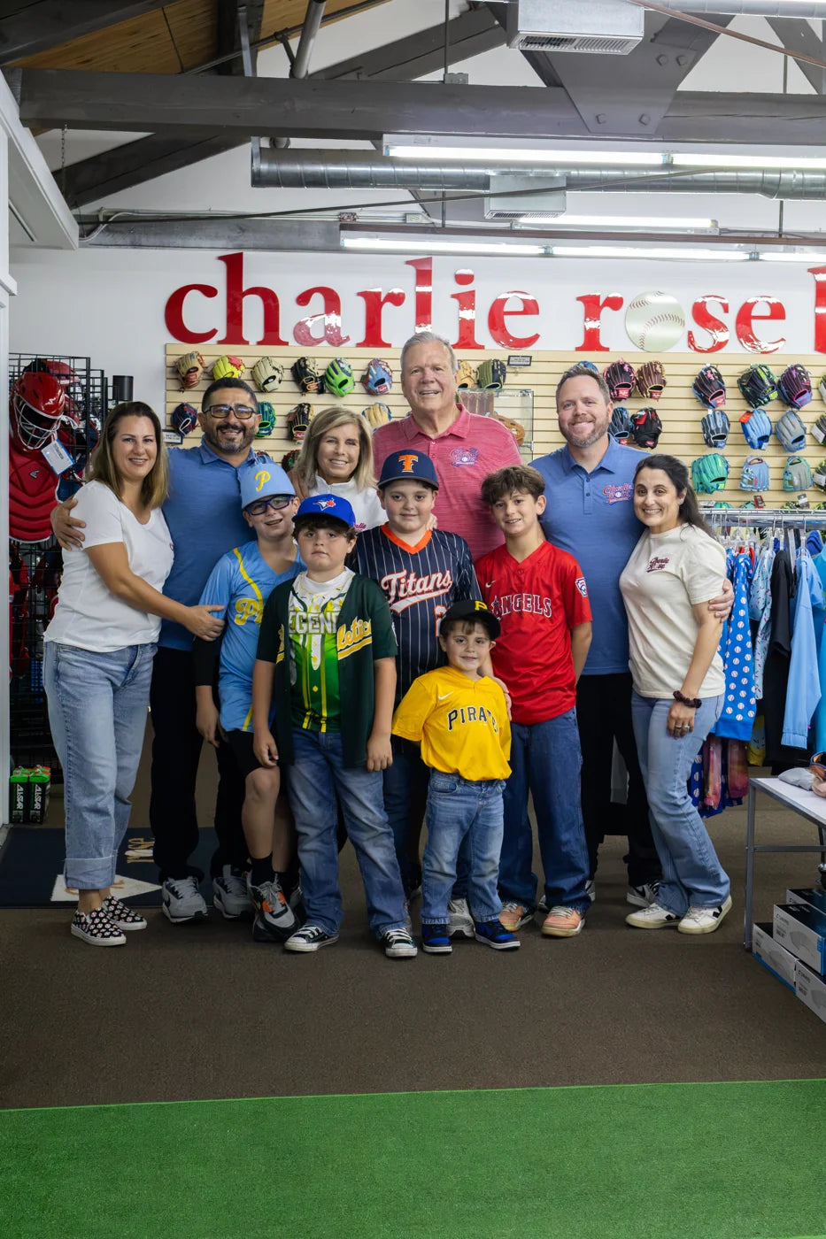 Adults and children together inside the Charlie Rose shop
